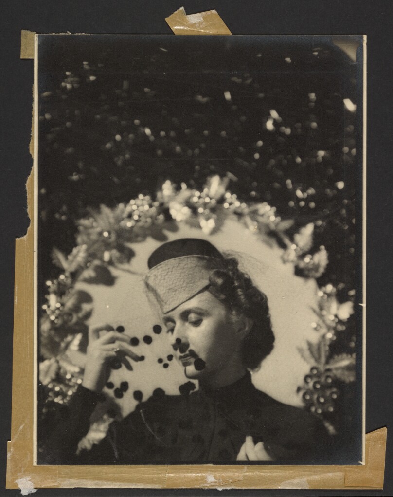 [Woman wearing hat]