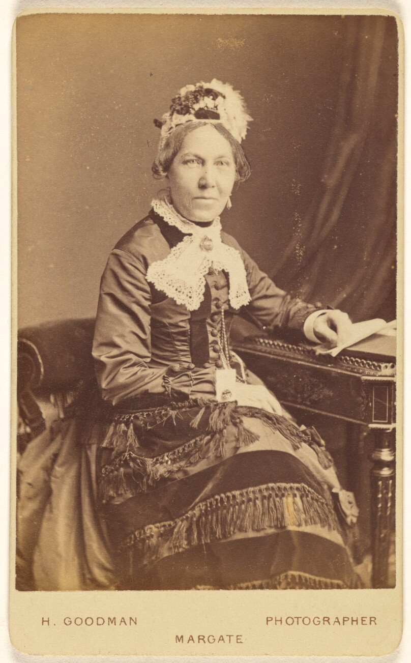 [Unidentified woman, seated]