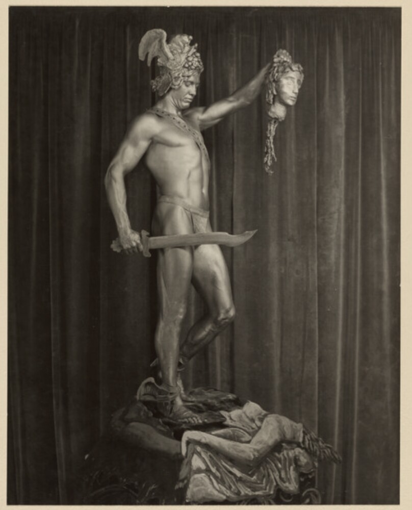 Model Posing as David Holding Goliath's Head