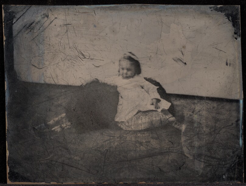 [Portrait of a child and dog]