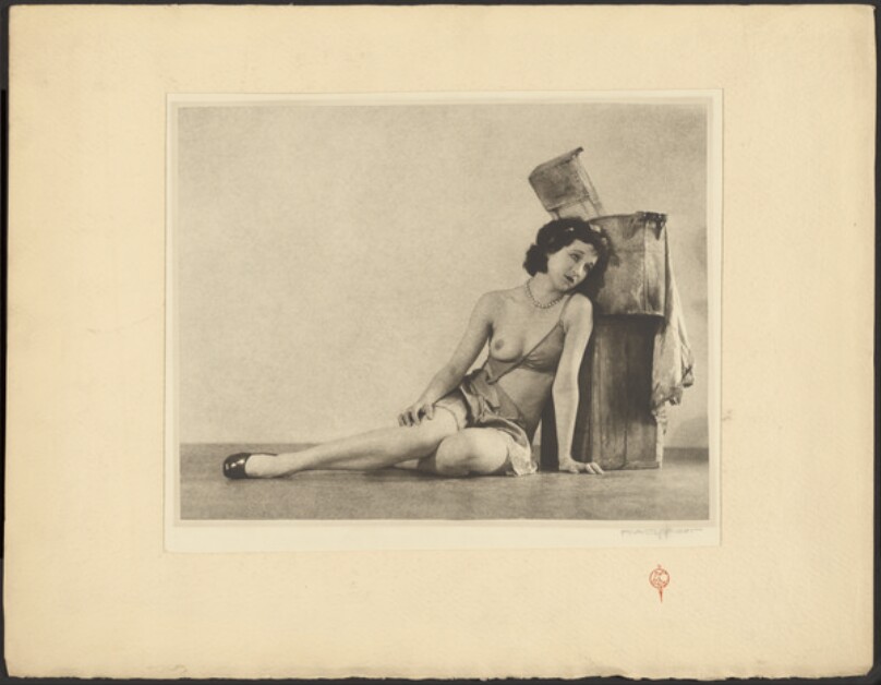 [Woman in torn clothes]