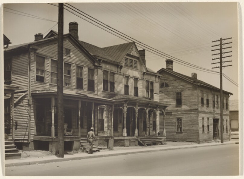 [Faulkner Country: Three Two-Story Houses on a Southern Street]