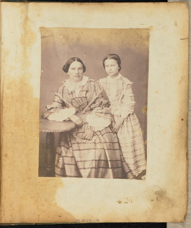 [Portrait of a woman and girl]