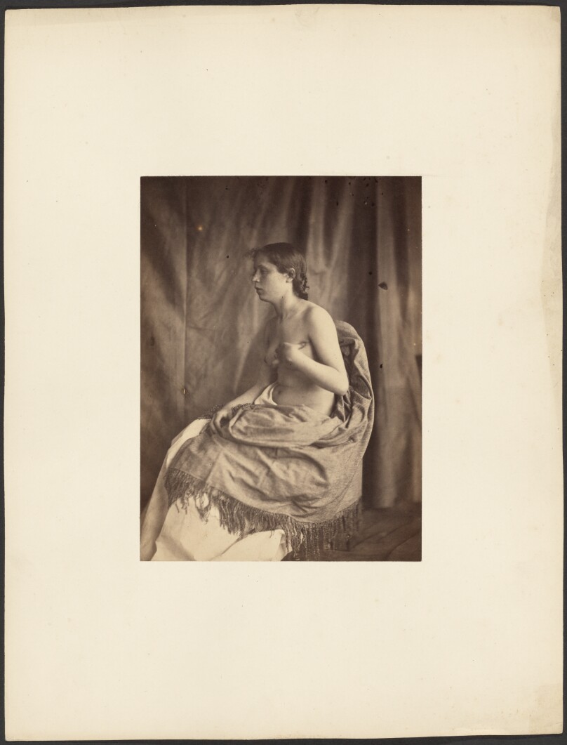 [Draped nude female model]