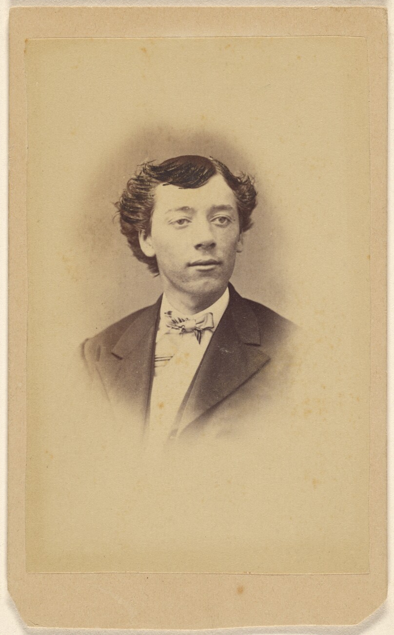 [Unidentified young man wearing a bowtie, printed in vignette-style]