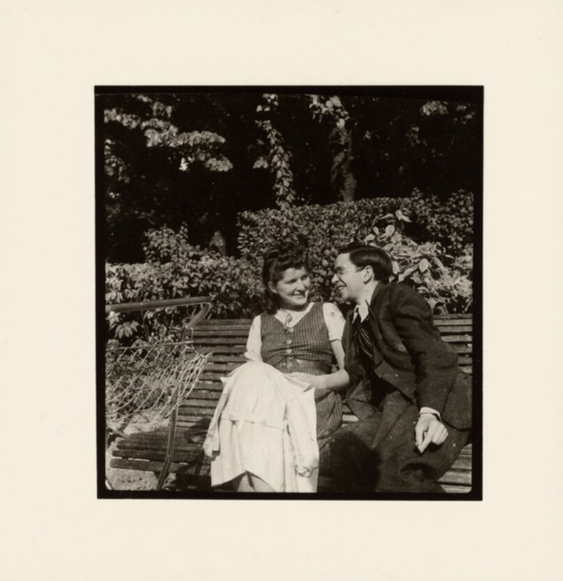 [Couple on park bench]