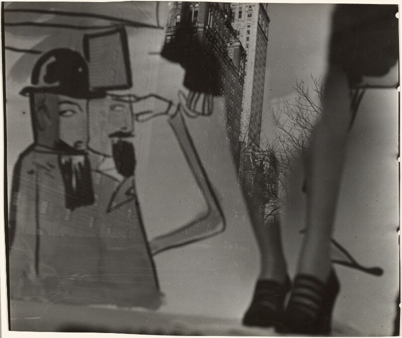 Legs in Bergdorf Goodman's window with drawings of Bemelmans.
