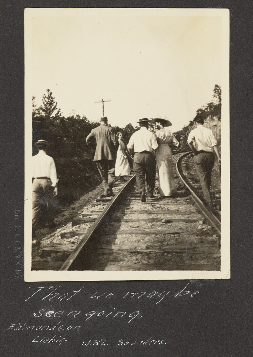 [View of People Walking on Train Tracks]