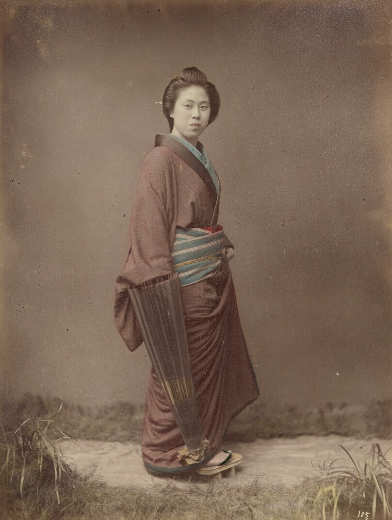 [Woman with Closed Umbrella]