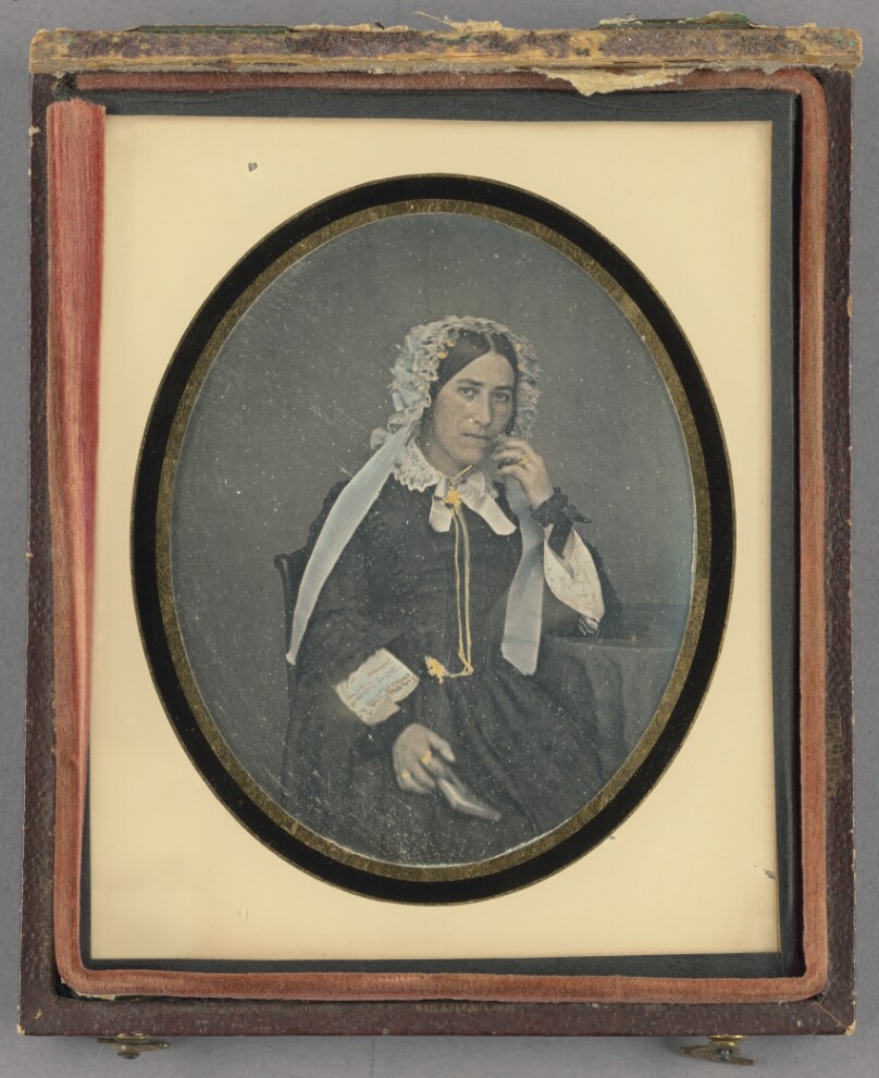 [Portrait of a Seated Woman in Bonnet Holding a Book]