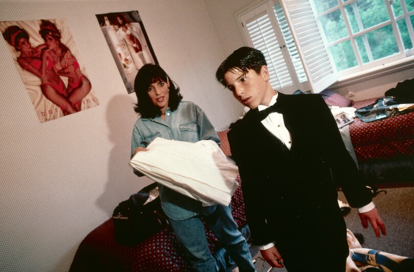 Ari, 13, in his bedroom with his mother, Encino