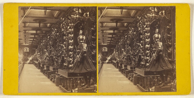 The Tower of London. The Horse Armory...the South Side of the Gallery, with Footmen...walls are profusely decorated...trophies.