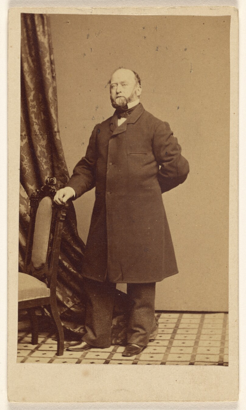 [Unidentified bearded man, standing]