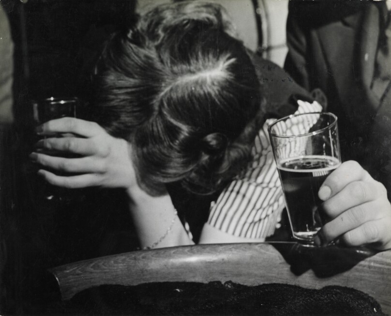 [Woman leaning on hand, Nick's Nightclub]