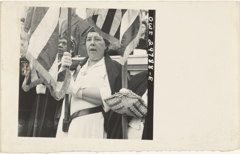 An American Legion Color Bearer Singing "America" in the Amphitheater, Arlington Cemetery, Arlington, VA