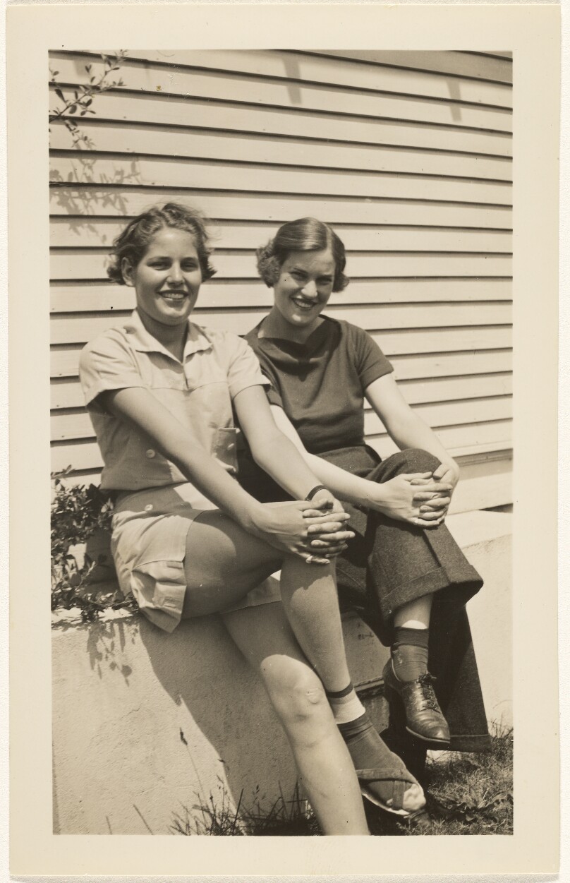[Two seated women]