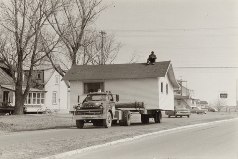 [House on flatbed trailer]