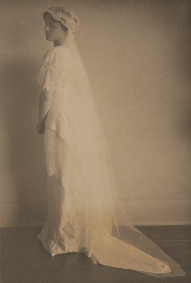 [Full-length portrait from behind of Gertrude Walsh]