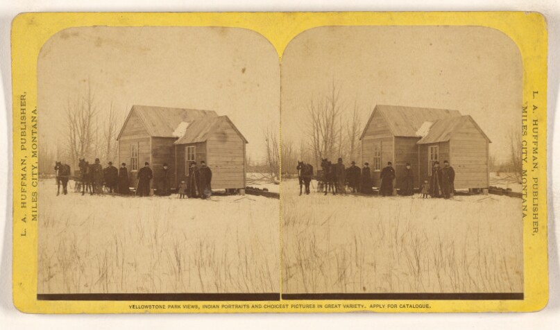 [View of homestead with family in front of house, possibly at Miles City, Montana]
