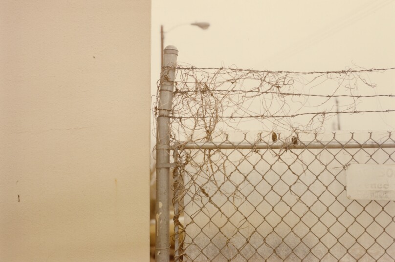 [Barbed wire and chain-link fence, U.S.A.]