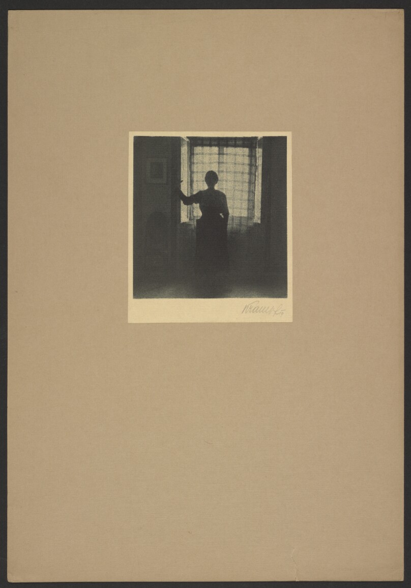 [Woman in front of window]