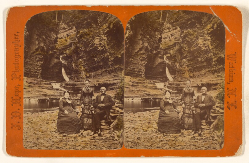 [Older couple posed with possibly their daughter at Watkins, New York]