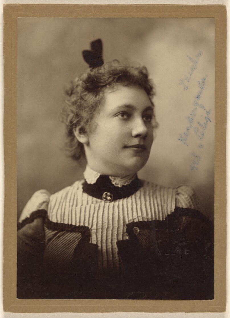 [Unidentified woman, in 3/4 profile]