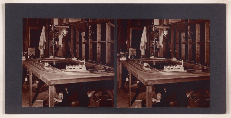 [Toy train set in garage]