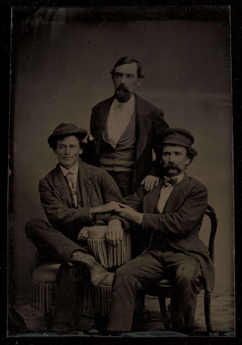 [Portrait of three men]