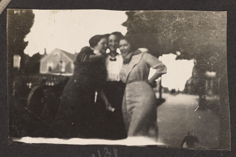 [Three women pose for a group portrait]
