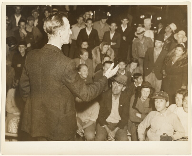 Organizer for the United Cannery Agricultural Packing and Allied Workers of America (CIO) Addresses Street Meeting of Striking Farmers, Mexican Town, outside Shafter, California