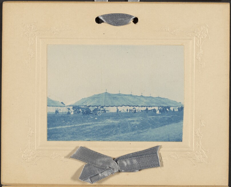 [Large tent in a field]