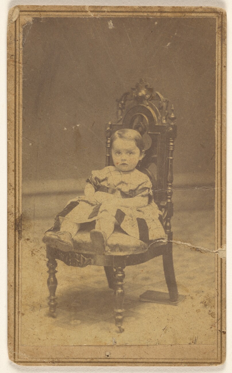 [Unidentified baby girl, seated]