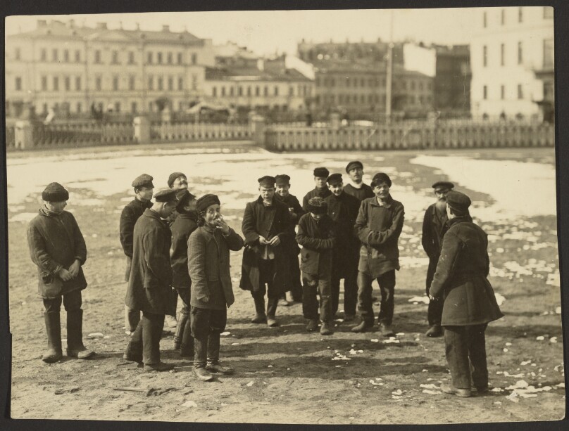 A group of St. Petersburg hooligans pitching pennies.