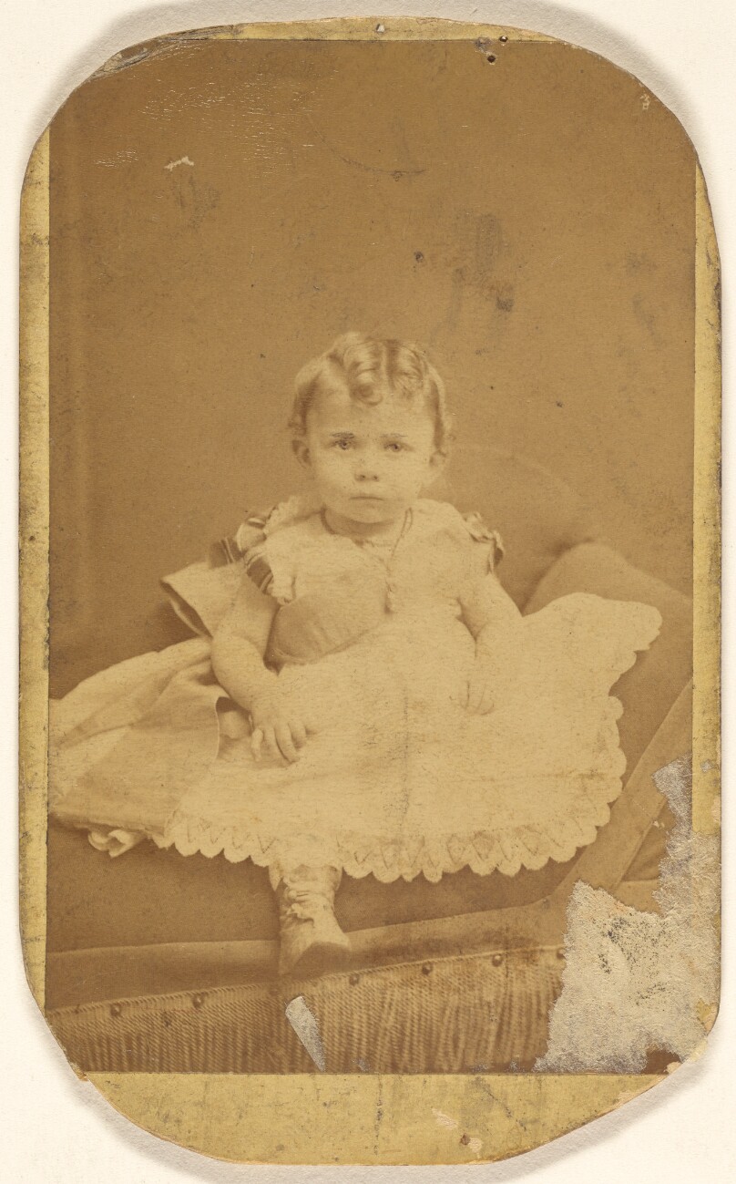 [Unidentified infant girl, seated]