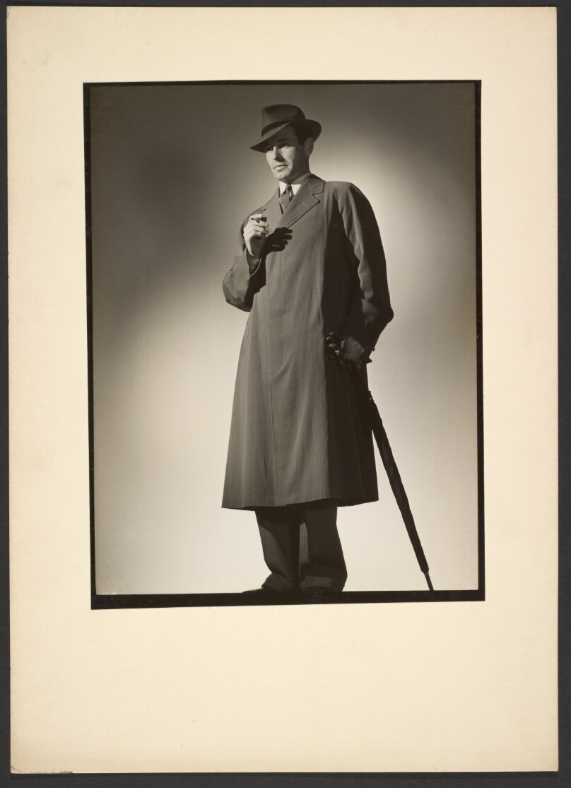 [Man modeling trench coat]