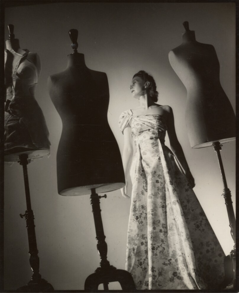 Model Posing Among Dress Forms, London