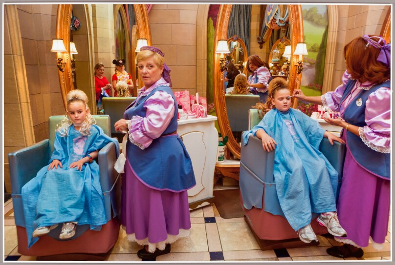 “Fairy Godmothers-in-Training” transform little girls into princesses at the Bibbidi Bobbidi Boutique at Walt Disney World, Orlando, Florida, 2013