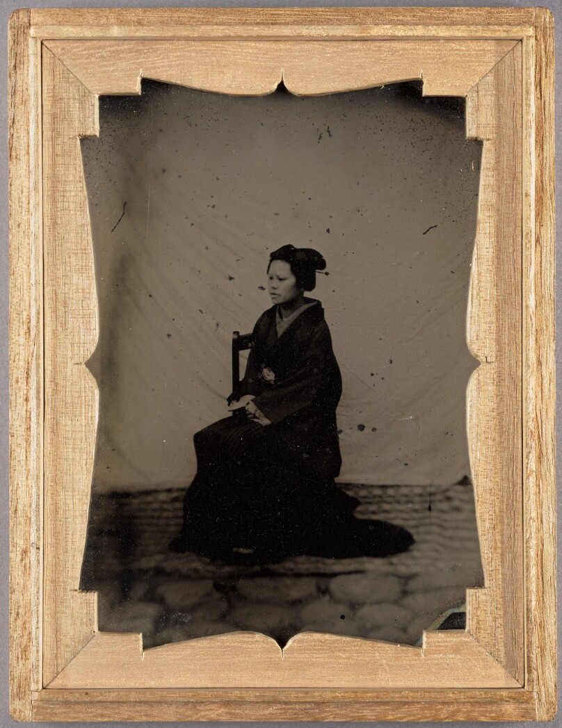 [Seated Woman]