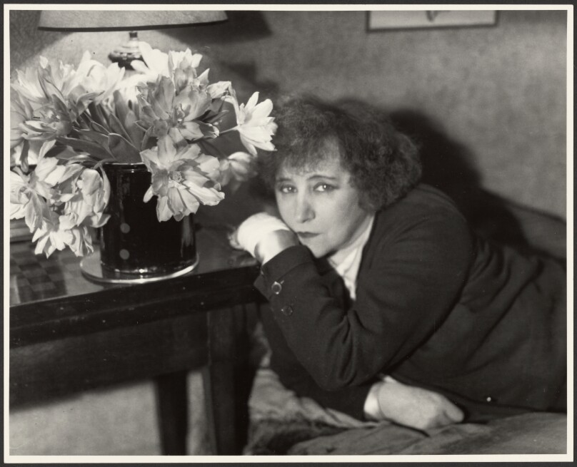 [Colette with flowers]
