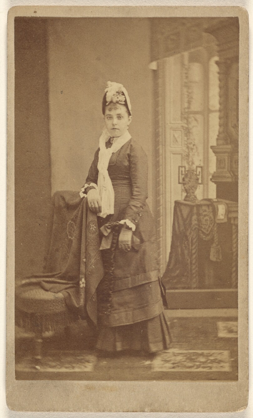 [Unidentified young woman, standing]