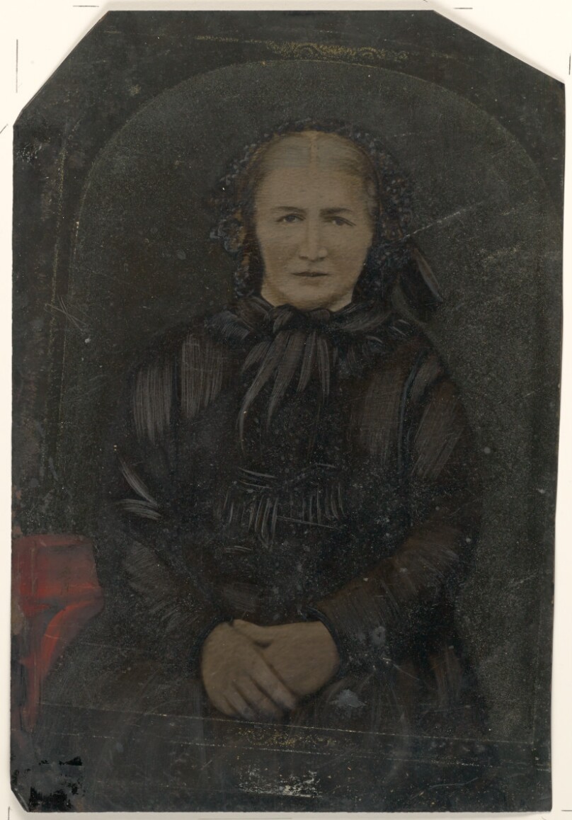 [Portrait of woman in black bonnet]
