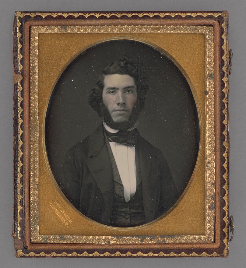 [Portrait of a young man with thick chin beard]