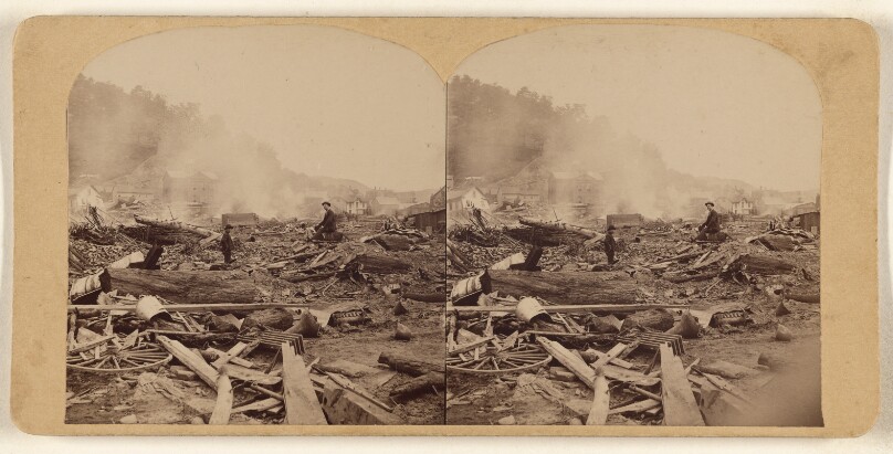 The Great Johnstown Flood, May 31, 1889. A view from near the corner of Main and Clinton streets. Burning the debris...