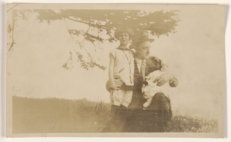 [Man with a young girl and baby]