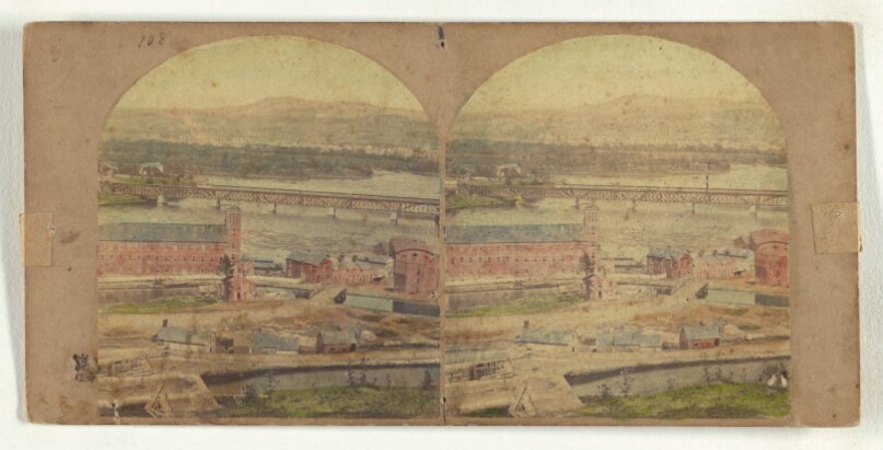 Cohoes Village, Erie Canal in the foreground, Railroad Bridge in the distance.