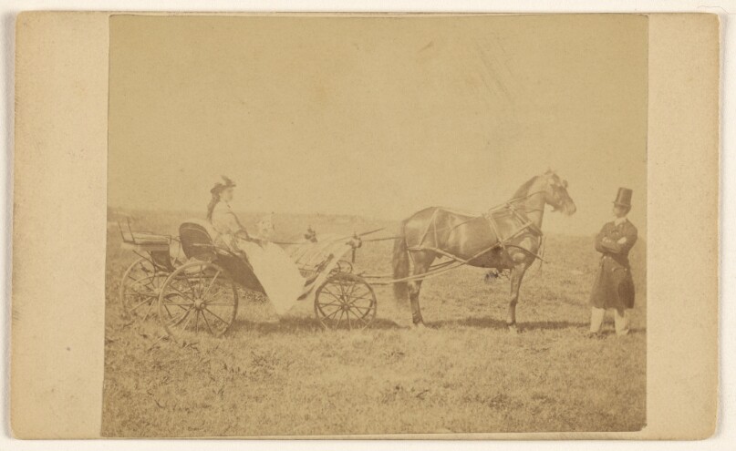 [Unidentified woman seated in a horse-drawn carriage, unidentified man in top hat, standing]