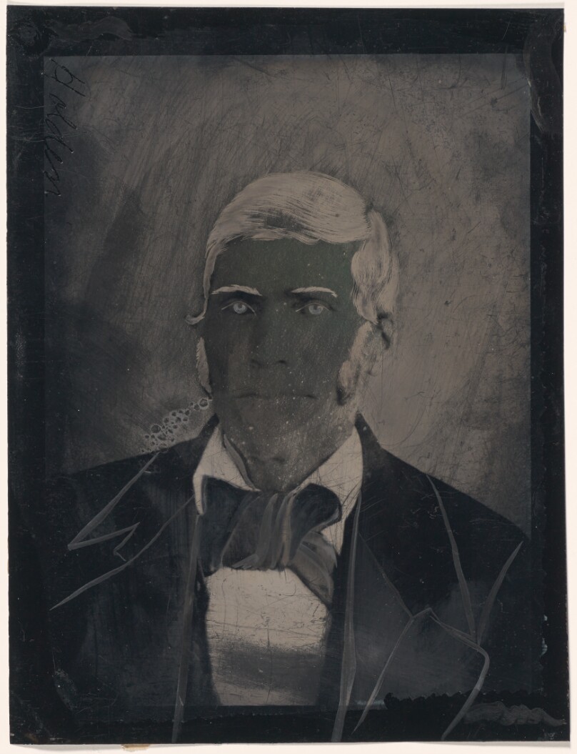 [Portrait of man with large bow tie]