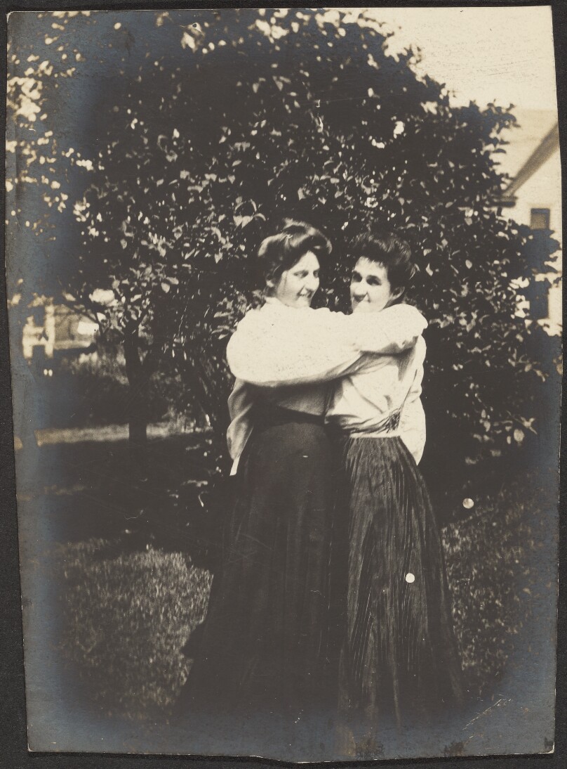 [Two women hugging]