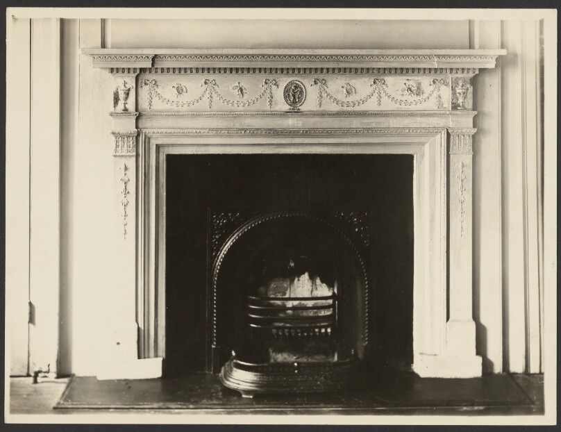 [Fireplace with carved mantelpiece]